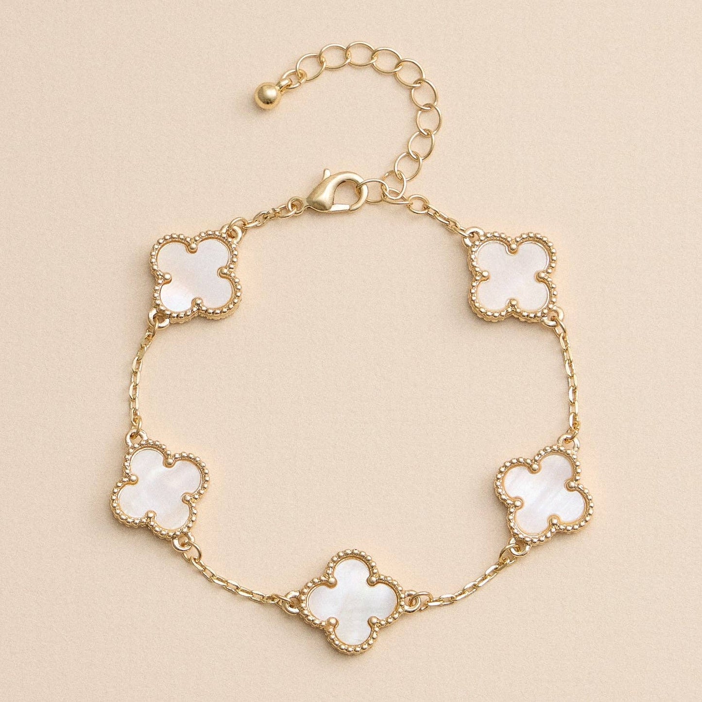 Shell Charm Bracelet with Gold Detailing